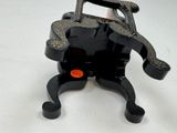a small black object that is on a white table