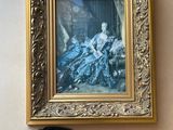 a picture of a painting on the wall next to a pen