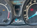 a close up of a car dashboard with a speedometer