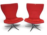 two red chairs with black legs and a white background