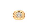 a yellow gold and diamond ring