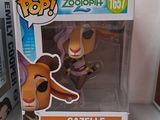 funko pop vinyl figure of a dog in a box and a pop vinyl figure of a dog in a box