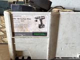 a box of tools sitting on a table in a warehouse