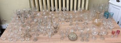 a lot of empty wine glasses on the table