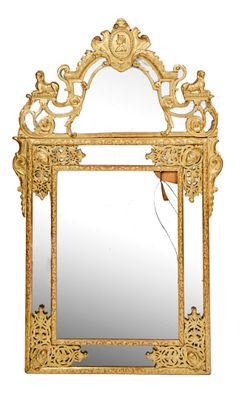 une image représentant un miroir doré sur fond blanc