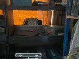 a shelf with a lot of tools on it in a room