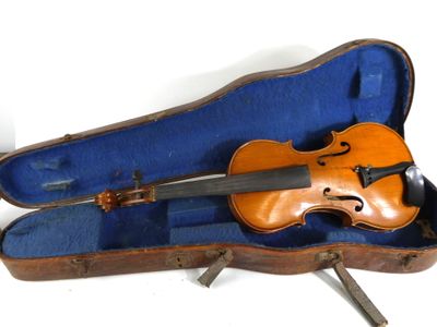 a violin in a case with a bow in it