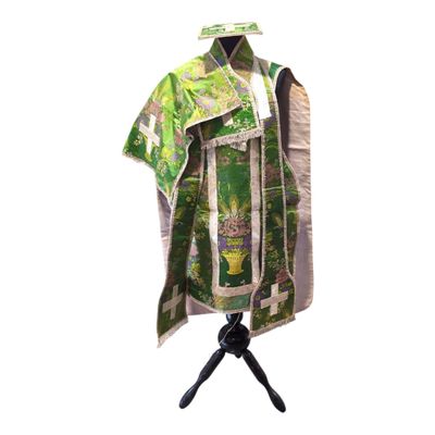 an image of a green and white robe on a tripod stand