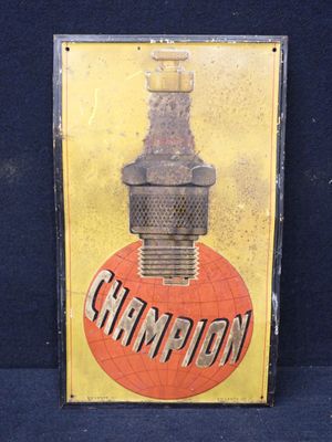 une pancarte sur laquelle est inscrit « champion » sur fond bleu