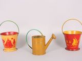 three buckets that are sitting next to each other on a table