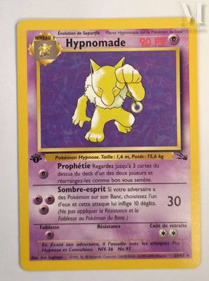 a close up of a pokemon card on a white surface