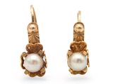 an image of a pair of gold and pearl earrings