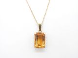 an image of a necklace with a yellow topazte stone