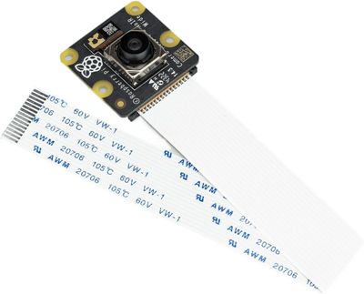a close up of a piece of paper with a camera attached to it