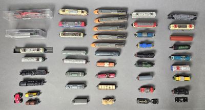 many different types of toy trains on the table