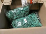 two bags of rubber bands in a cardboard box