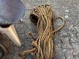 a scooter and rope on the ground next to a scooter