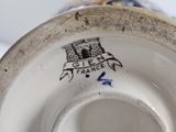 a close up of a plate with a castle on it