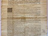 a piece of paper with a declaration on it on top of a table