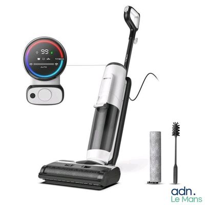 a close up of a vacuum cleaner with a toothbrush and toothpaste
