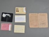 some old papers are sitting on top of a table