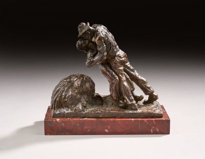an image of a bronze statue of a man and a dog