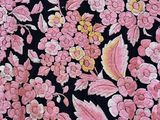 an image of a close up of a black and pink floral print fabric