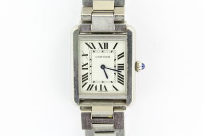 an image of a silver wrist watch with roman numerals on it