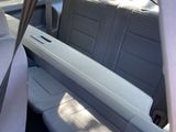a seat in the back of a car that is empty