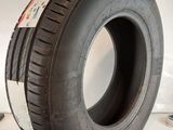 an image of a tire on a white surface with a white background