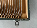 six forks in a box with a spoon and fork in it