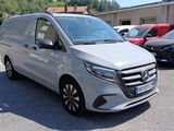 the silver van is parked in a parking lot with other cars