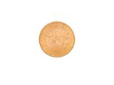 a close up of a gold coin on a white background