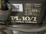 a close up of a machine with a hose attached to it