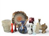 a lot of glass vases that are sitting on a table
