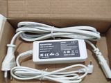 a box that has a charger and a cord in it