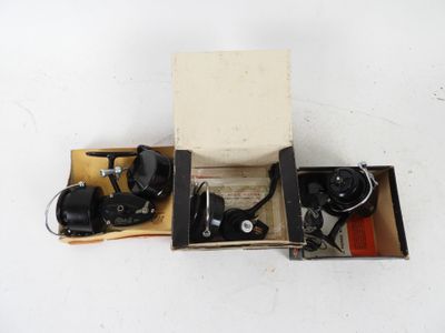 a box with two cameras in it on a white surface