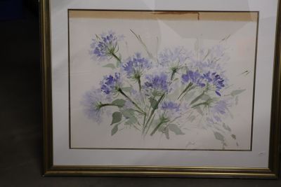 J. DONNAT "Fleurs" aquarelle signée en bas à droite.