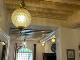 an image of a dining room with a large chandelier
