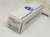 a white box with a blue stripe on it sitting on a table