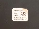 a close up of a sticker on the back of a laptop