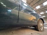 a car that is parked in a garage under a roof