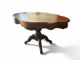a small table with a wooden top on a white background