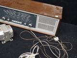 a radio that is sitting on a table next to some wires