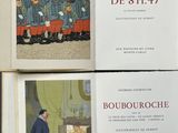trois livres posés sur une table, sur lesquels figurent des photos de soldats en uniforme