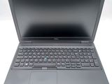 the laptop is open and ready to be used on the desk