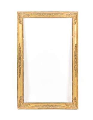 an antique gold frame with a white background