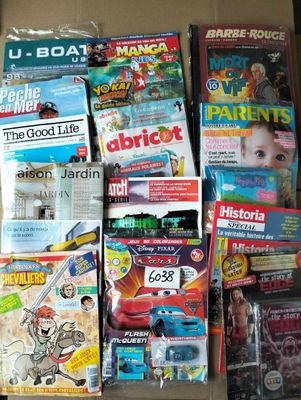 a lot of children ' s books and toys in a box