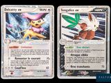 Deux cartes Pokémon sont représentées côte à côte sur un fond noir.