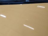 a picture of a car that has been painted yellow